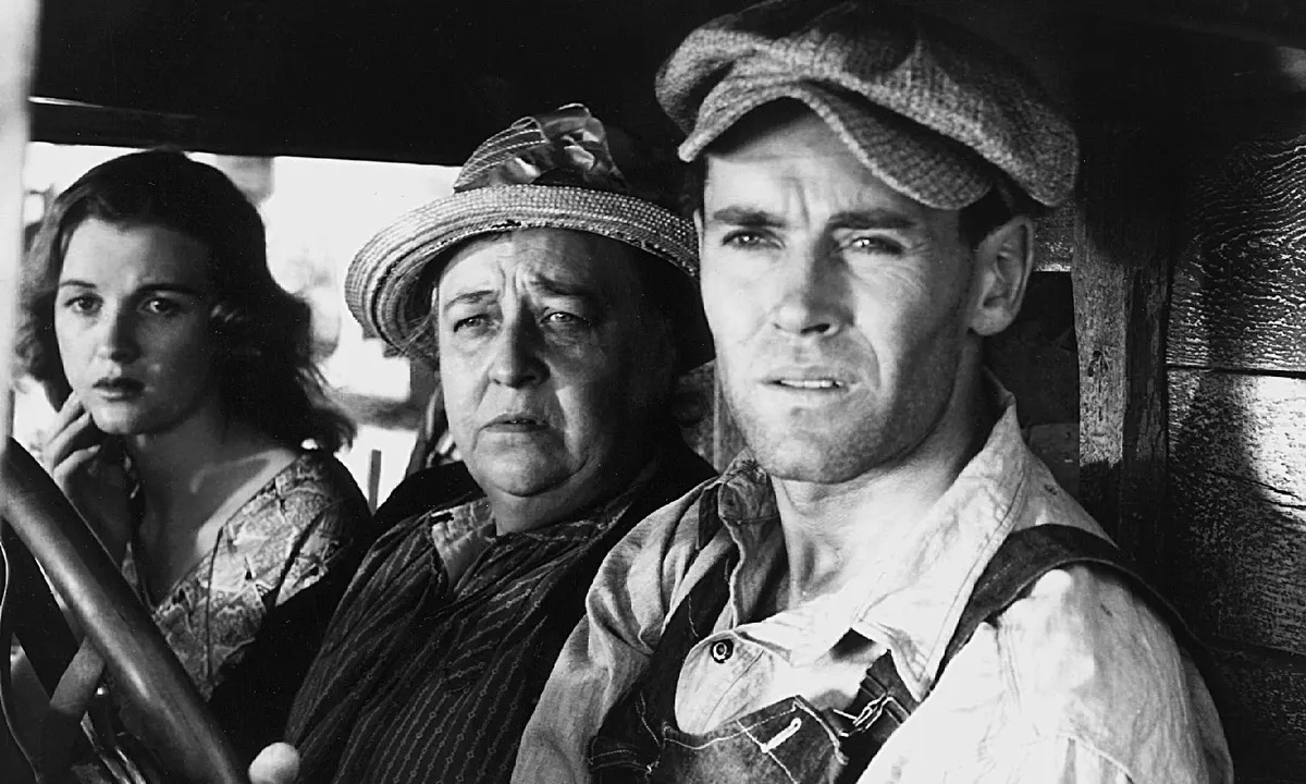 Three people in a cab of a truck from "Grapes of Wrath" film